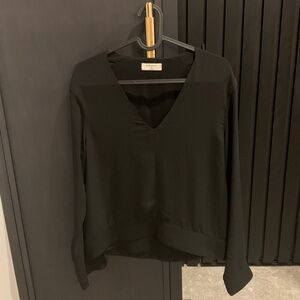 26. Aritzia Babaton Classic V-neck Blouse